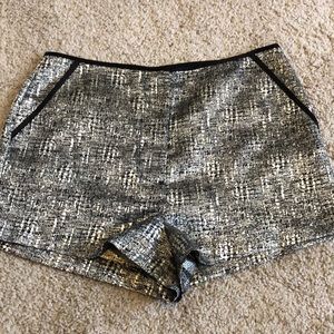 Forever21 black and gold short shorts. Size 6.